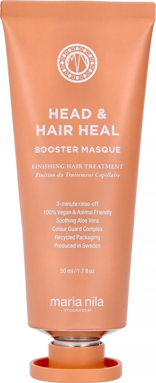 En persikfärgad tub märkt 'Head & Hair Heal Booster Masque' för hårvård, med beskrivningar av naturliga ingredienser och användning.