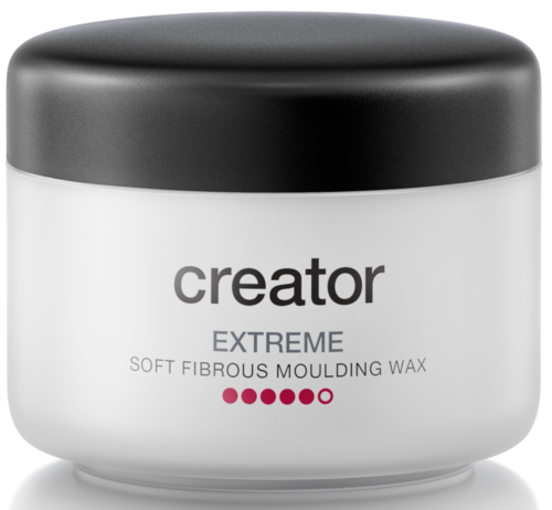En vit burk med svart lock märkt 'creator EXTREME SOFT FIBROUS MOULDING WAX'.