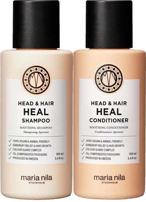 Zwei Flaschen Haarpflegeprodukte, Shampoo und Conditioner, von Maria Nila für beruhigende Haarrheparatur.