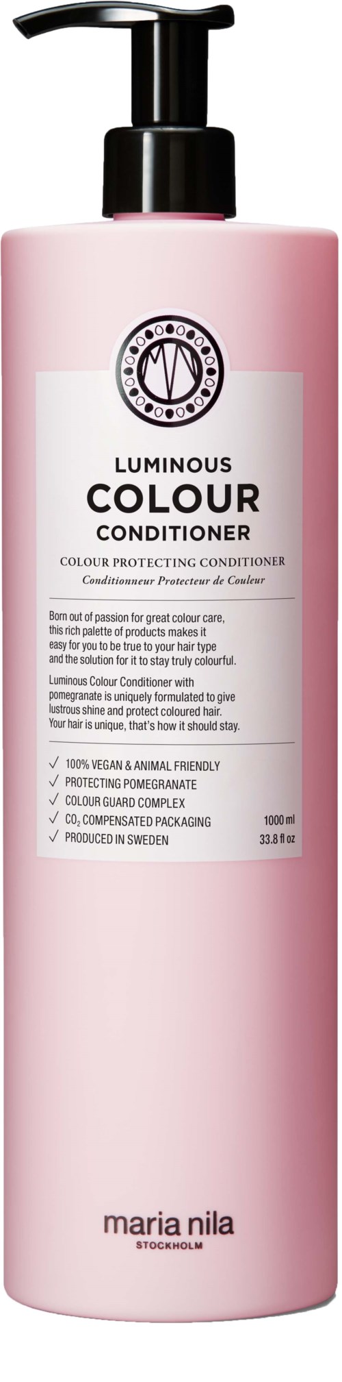 Lange rosa Flasche mit schwarzem Pumphahn, gekennzeichnet 'Luminous Colour Conditioner'. Enthält Haarspülung. Die Marke ist Maria Nila.