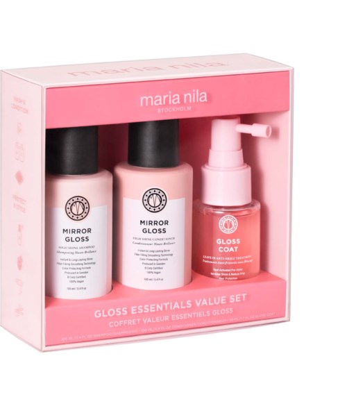 Et sett med tre rosa og hvite neglelakkprodukter i en eske fra Maria Nila.