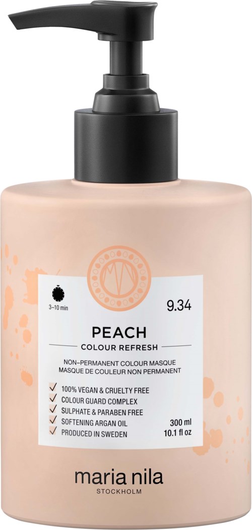 En rosa flaska med Maria Nila Peach Colour Refresh hårinpackning med svart pump.