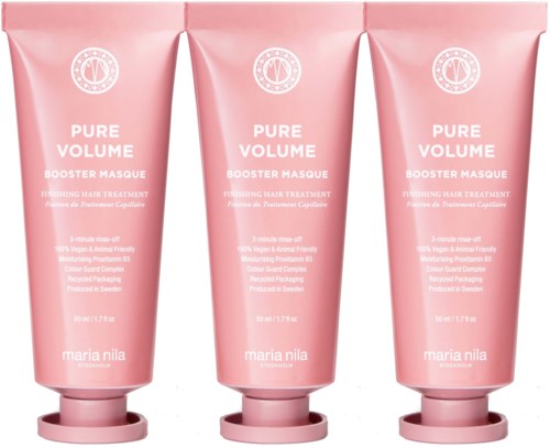 Drei rosa Haarmasken, aufgereiht, mit "Pure Volume" und "Booster Masque" für Haarpflege.