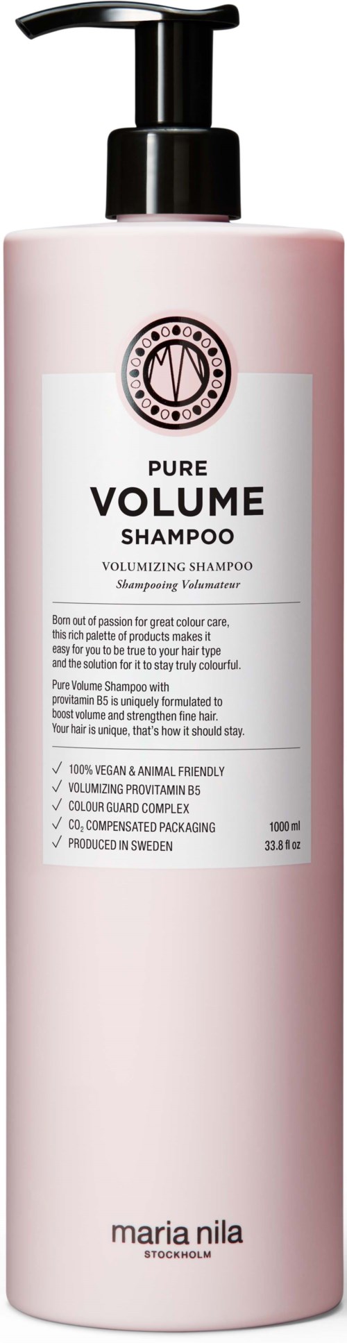 A tall, pink bottle of Maria Nila Pure Volume Shampoo with a pump dispenser.
