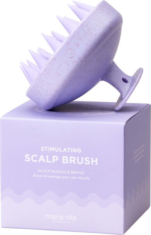 Een paarse hoofdhuidmassageborstel met spitsen borstel zit op een lichtpaarse doos. De doos heeft tekst die het product beschrijft.