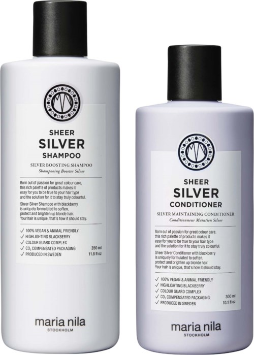 Two bottles of Silver shampoo and conditioner from Maria Nila, with black caps and white labels.