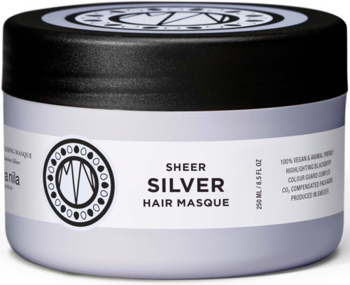 Ein Behälter mit silberner Haarmaske, schwarzer Deckel, weißes Etikett mit Text zu vegan, tierschutzfrei und Inhaltsstoffen.