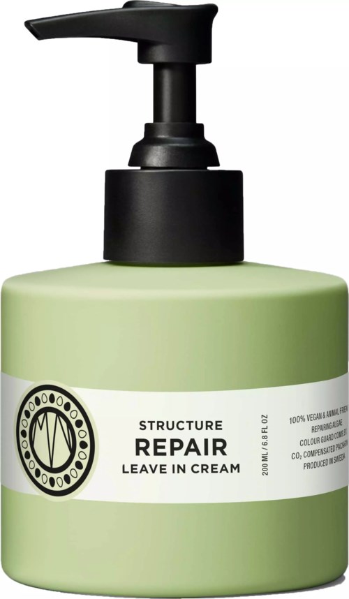A green bottle with a pump dispenser says structure repair leave in cream for hair.
