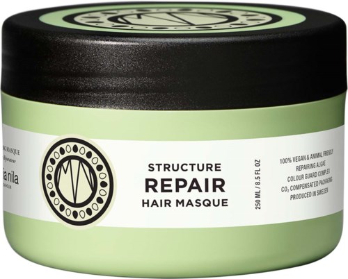 Groene en witte pot met zwarte deksel voor Structure Repair Hair Masque. Het is veganistisch en bevat reparerende algen.