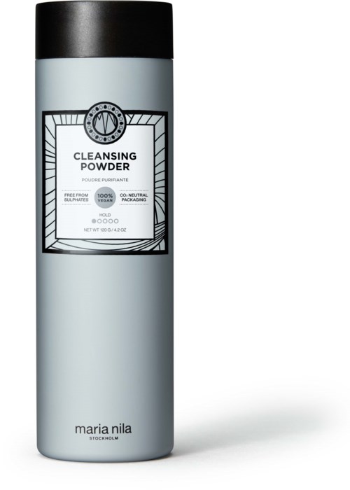 En lång, ljusblå cylindrisk behållare märkt 'Cleansing Powder' med svart lock och minimalistisk design.