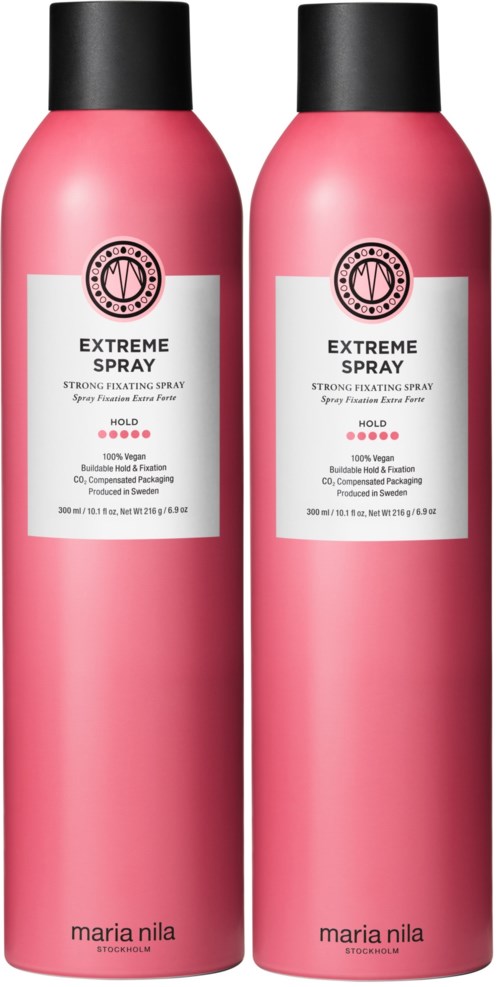Two pink bottles of extreme spray hair product, labeled as a strong styling spray, by Maria Nila.