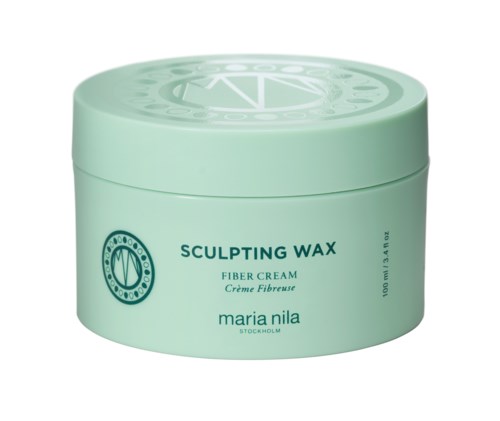 En rund, mintgrön behållare märkt 'Sculpting Wax Fiber Cream' av Maria Nila från Stockholm.