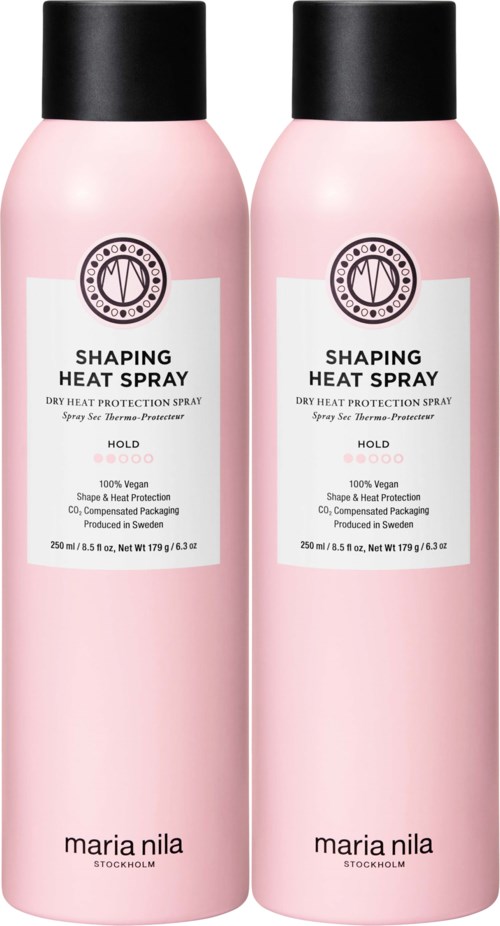 Two pink bottles of heat protection spray with black caps, labeled as 'Shaping Heat Spray' for hair.