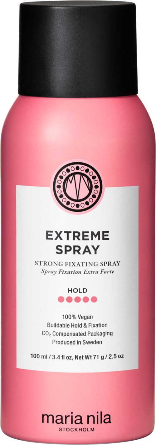 Pink spray can labeled 'Extreme Spray' for fixing hair, with black cap and white and pink text.