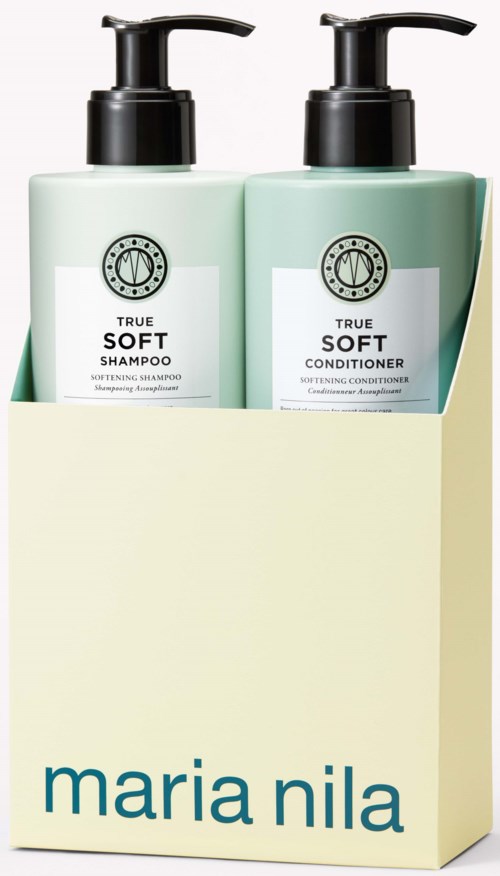 Two bottles of shampoo and conditioner in a cream-colored box with blue text reading 'maria nila'.
