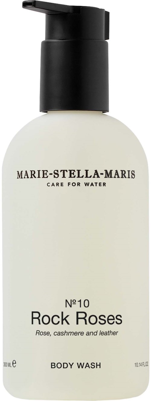 En vit body wash-flaska med svart pump, märkt Marie-Stella-Maris, doften Rock Roses, för vattenskötsel.