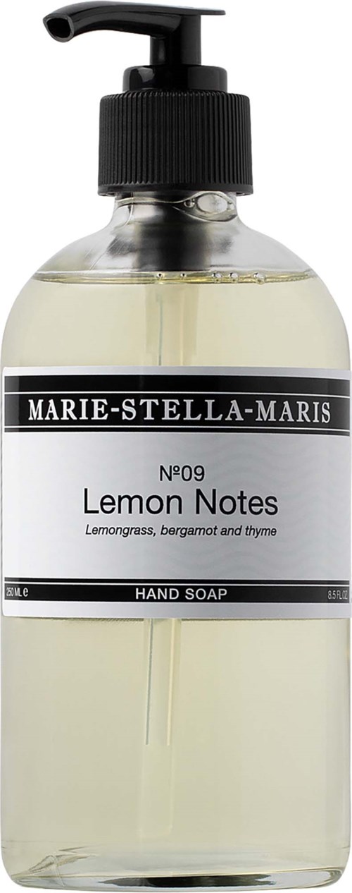 En tydlig flaska med handtvål med svart pump, märkt Marie-Stella-Maris Lemon Notes handtvål.
