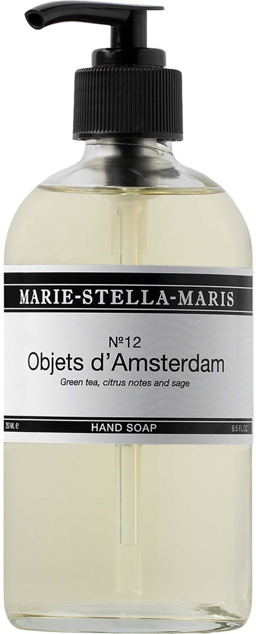 A clear bottle of hand soap with a black pump and a label saying Marie-Stella-Maris, Objects d'Amsterdam, green tea scent.