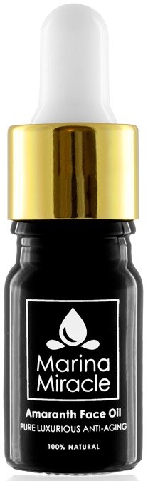 Kleine schwarze Flasche mit Tropfenpipette, beschriftet 'Marina Miracle Amaranth Face Oil' für Hautpflege.