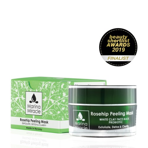 Ein grüner und weißer Behälter und Schachtel mit Marina Miracle Rosehip Peeling Mask, Finalisten-Logo, italienisches Hautpflegeprodukt.