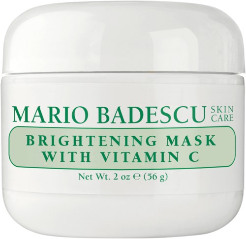 Valkoinen purkki, jossa lukee 'Mario Badescu Brightening Mask with Vitamin C' ihonhoitoon.