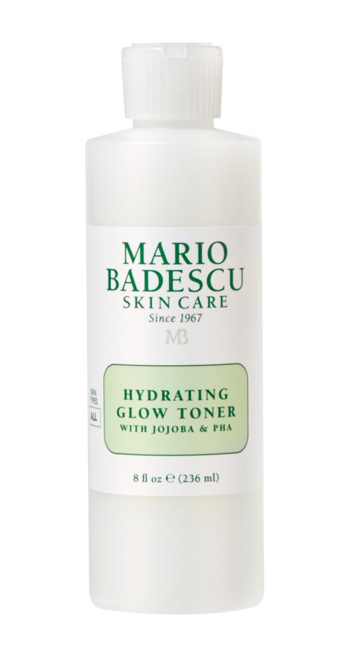 Valkoinen pullo, jossa vihreä ja musta teksti, merkintä Mario Badescu Hydrating Glow Toner Jojoballa ja PHA:lla.
