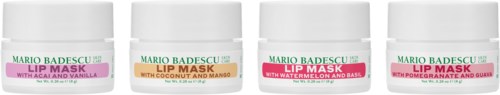Fyra Mario Badescu läppmaskbehållare med olika smaker står uppställda.