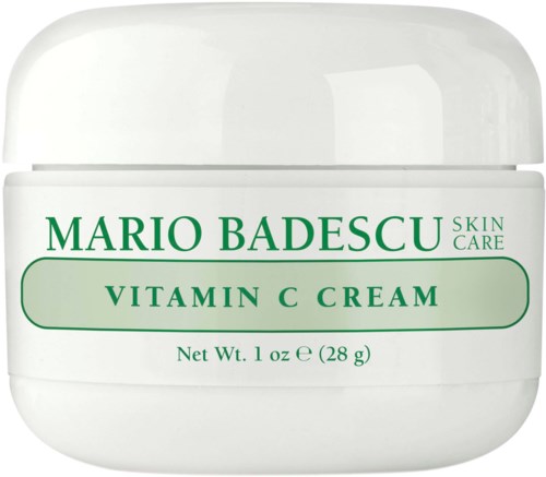 Valkoinen purkki, jossa lukee 'Mario Badescu Vitamin C Cream' ihonhoidolle, sisältää 28 grammam ainetta, vihreä etiketti.