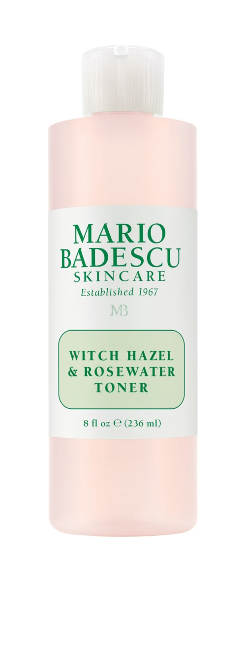 Een roze flesje van Mario Badescu skincare, toverhazelaar en rozenwater toner, met wit label.