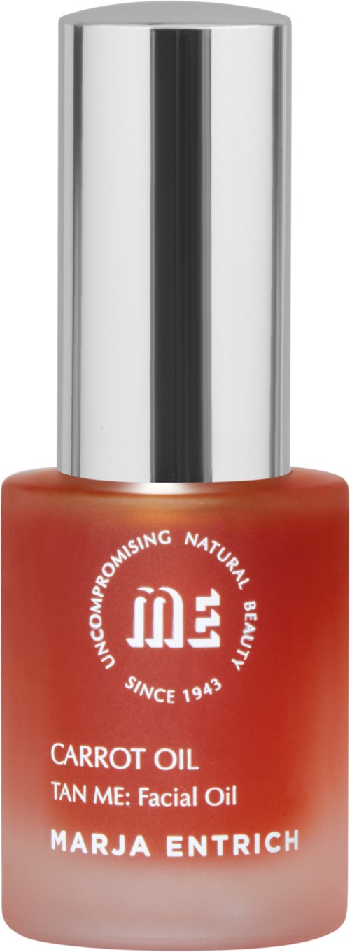 A small bottle of carrot face oil, with a silver cap and white text, branded as Marja Entrich.