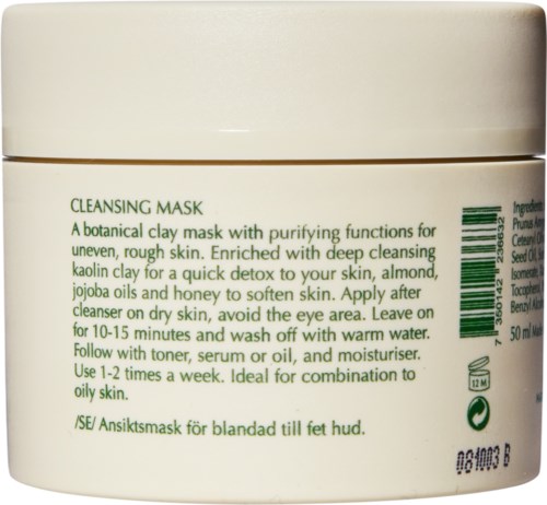 A creamy container with green text describing a clay mask for skin cleansing and detox.