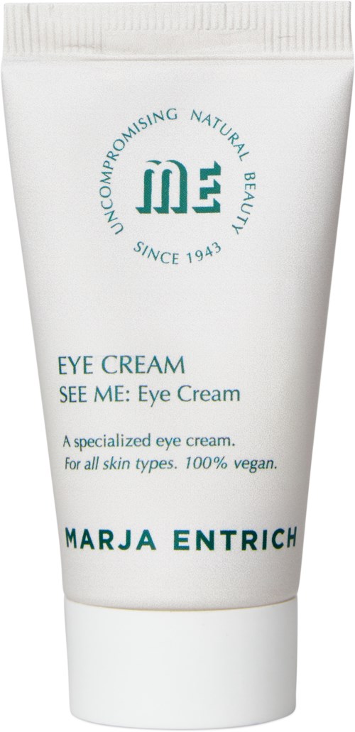 A white tube of eye cream labeled Marja Entrich, with blue and green text, promoting natural, vegan skincare since 1943.