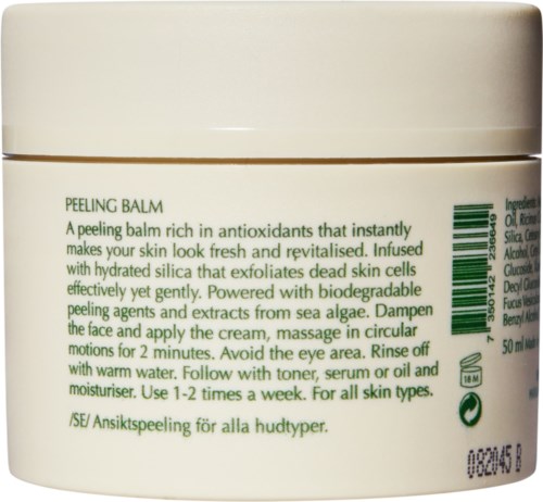 A white jar of peeling balm with green text describing its benefits and usage instructions. Contains ingredients and recycling symbols.