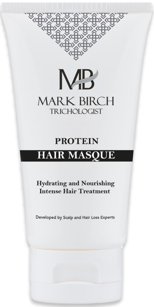 White hair mask tube with black and silver text, some decorative design at the top, and product details for hair care.