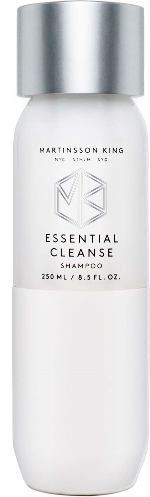 A white shampoo bottle with a silver cap from Martinnson King, called Essential Cleanse, 250 ml.