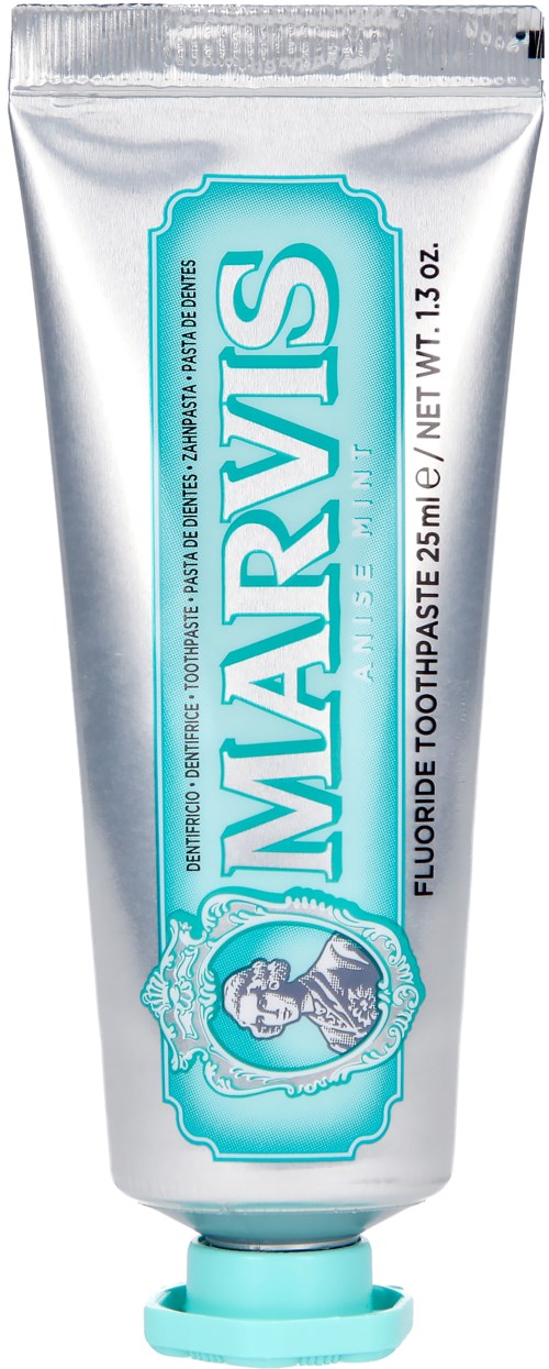 A silver tube of toothpaste with blue and white label, featuring a smiling woman image. It is Marvis brand with fluoride.