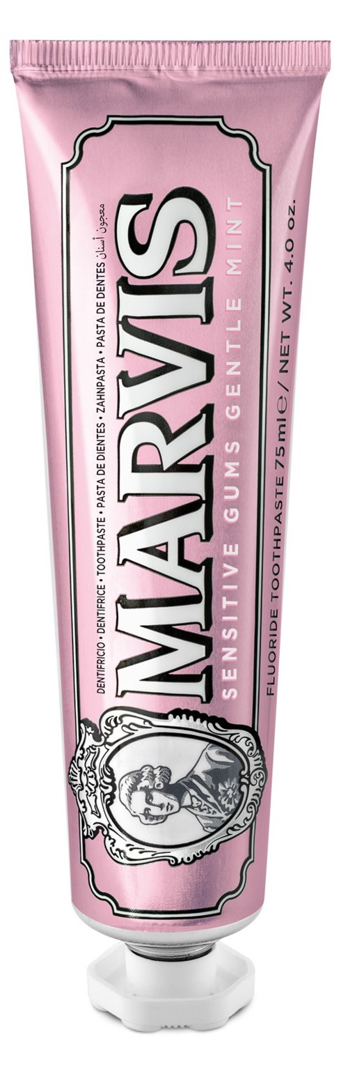 Pink tube labeled 'Marvis Sensitive Gums Mint'. Contains toothpaste, with a silver and pink design and an Italian figure.