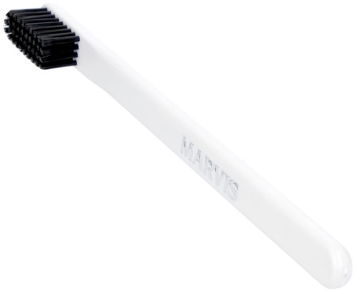 A white barbecue brush with black bristles for cleaning grill surfaces.
