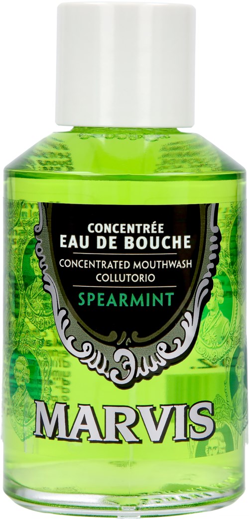 Green mouthwash bottle with a white cap, labeled Marvis Spearmint, contains concentrated mouthwash.