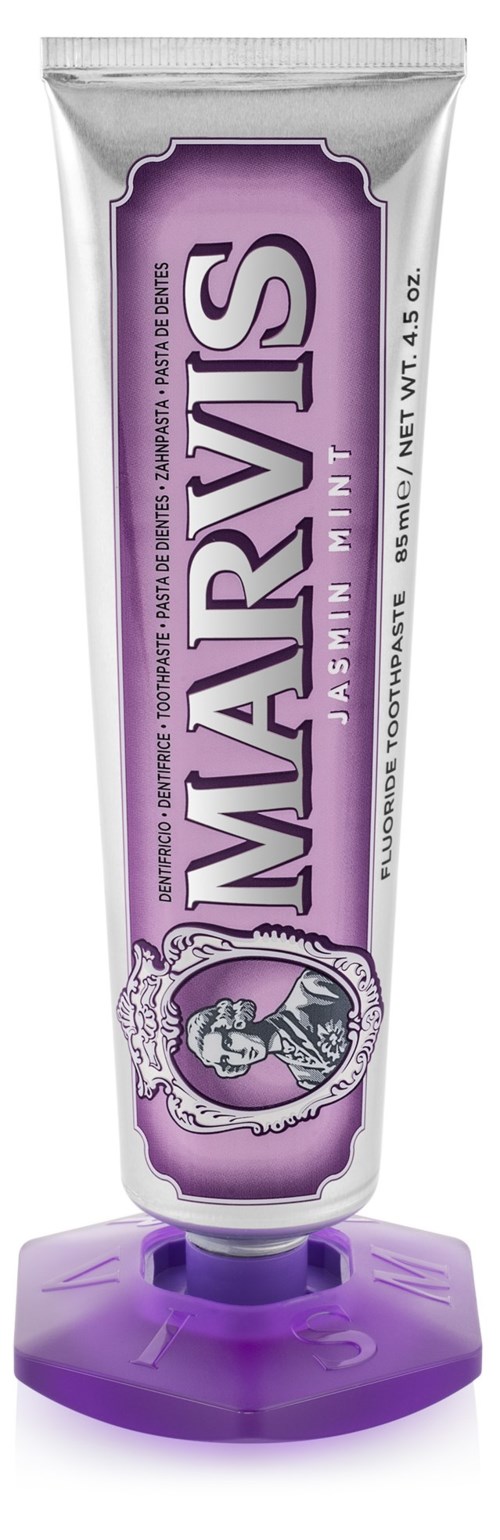 A tube of Marvis toothpaste with a purple cap and label, standing upright.