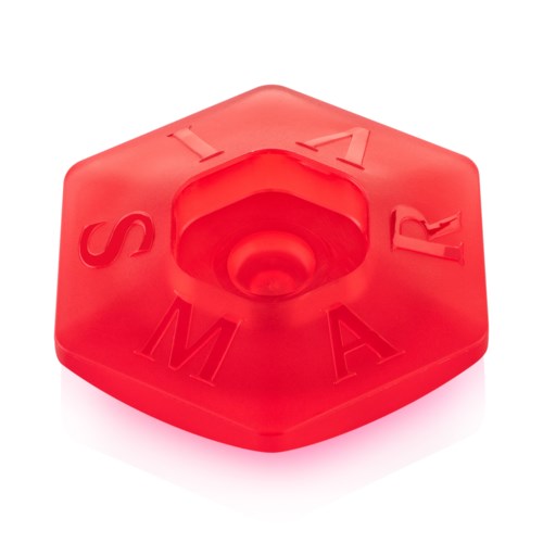 A red, hexagonal object with letters S, T, A, R, M, and Y on its sides.