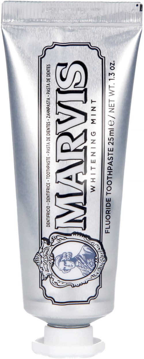 A silver tube with a label for 'MATRIX White + Plus' toothpaste, showing the product name and details.