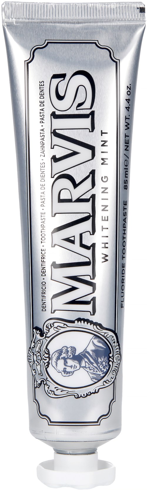 A silver tube of Marvis whitening mint toothpaste with black and white label design.