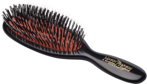 A hairbrush with black and red bristles, designed for hair grooming.