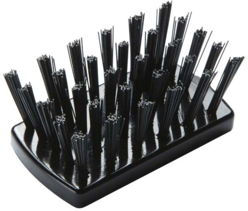 A black holder with multiple thin, black sticks standing upright.