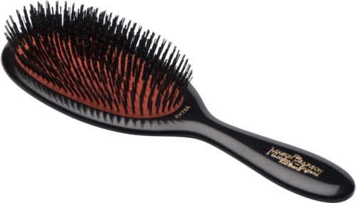 A black hairbrush with red and black bristles, featuring a shiny handle with gold text.