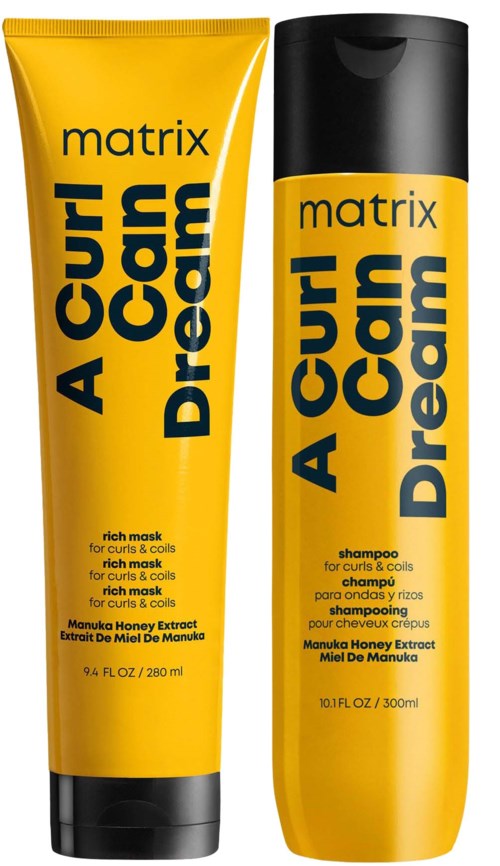 Zwei gelbe Haarprodukte mit schwarzen Deckeln, genannt 'A Curl Dream' und 'A Curl Dream Shampoo', für Locken und Coils.