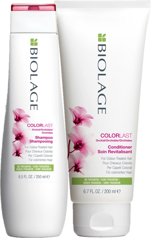 Biolage ColorLast Shampoo- und Conditioner-Flaschen mit Orchideen auf den Etiketten. Sie sind weiß mit pinken und grünen Akzenten.