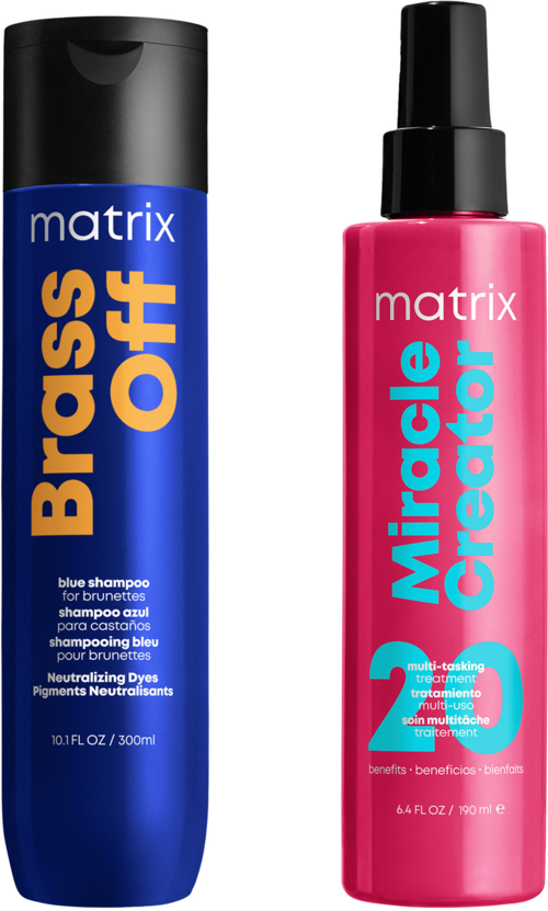 Zwei Haarpflegeflaschen, eine blaue mit Brass Off und eine pinke mit Miracle Creator, stehen nebeneinander.