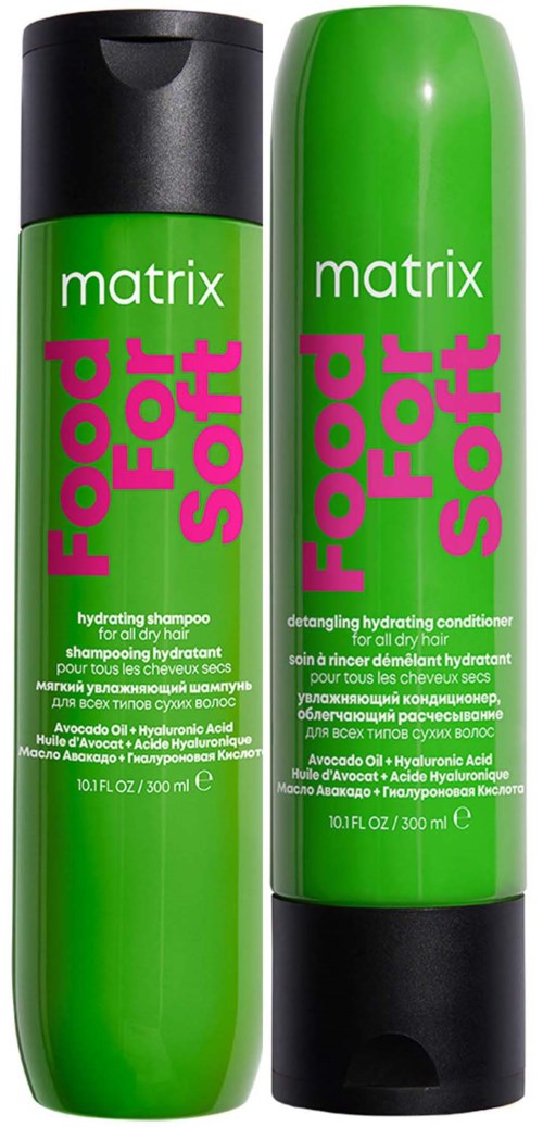 Zwei grüne Flaschen, eine mit 'hydrating shampoo' und die andere mit 'detangling hydrating conditioner,' stehen nebeneinander.